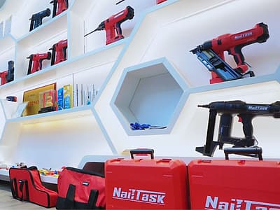 Finished NailTask cordless nail guns and carry cases in the factory showroom and sample room